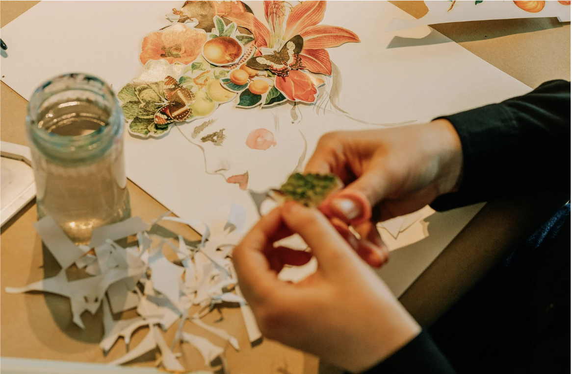 three silver paint brushes on white textile